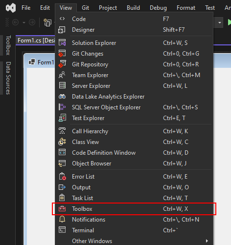 在 Visual Studio 2022 Windows 窗体项目中，工具箱项被突出显示在视图菜单中。