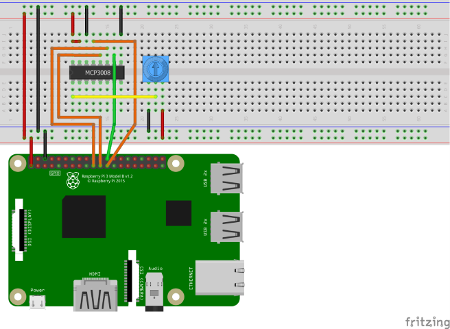 显示具有MCP3008 ADC 和强量计的线路的 Fritzing 示意图